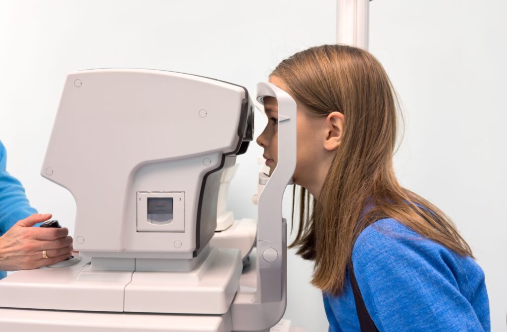 A child having their eyes examined at the optometrist's office.